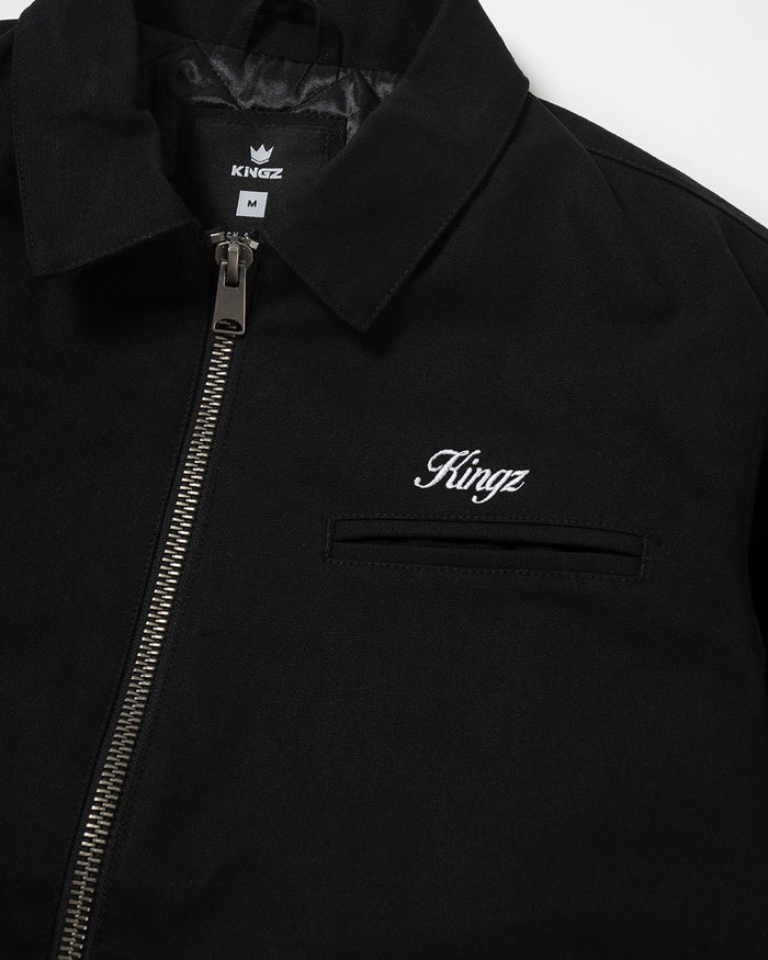 Kingz Mechanic Jacket Black - Close-Up Detail View Black Outerwear Metal Zipper Embroidered Kingz Logo Left Chest Crown Label Inside Collar Casual BJJ Training Apparel [color:Black]