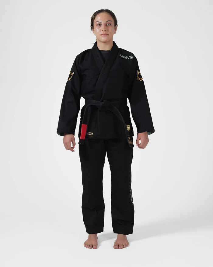 Kingz Nano 3.0 Terra Limited Edition Women's Jiu Jitsu Gi Black - Full Body Front View Female Athlete Black Gi Gold Crown Sleeve Patches Red Lapel Tag Embroidered Logos Premium BJJ Gi Training [color:Black]