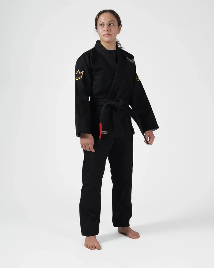 Kingz Nano 3.0 Terra Limited Edition Women's Jiu Jitsu Gi Black - Full Body Front View Female Athlete Black Gi Yellow Crown Badge Sleeve KINGZ Text Chest Premium Cotton BJJ Gi Training [color:Black]