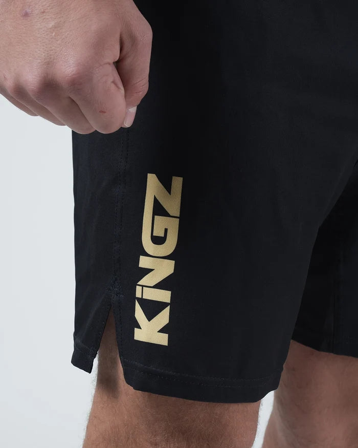 Kingz Player Special Limited Edition Shorts Black Gold - Close Up Leg Detail KINGZ Large Gold Metallic Hollow Text Left Leg Black Base Luxurious Gold-on-Black Design Men's Grappling Shorts No-Gi BJJ Limited Edition Branding [color:Black]