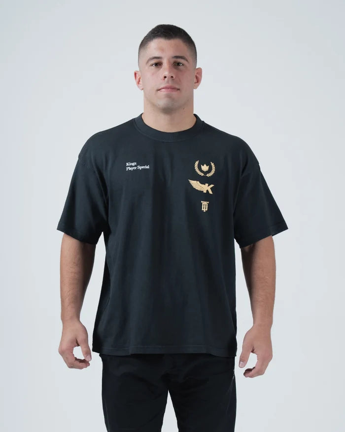 Kingz Player Special Tee - Front View - Gold Lotus Crown and Script Chest Graphics Tainan Dalpra - Black BJJ Tee [color:Black]