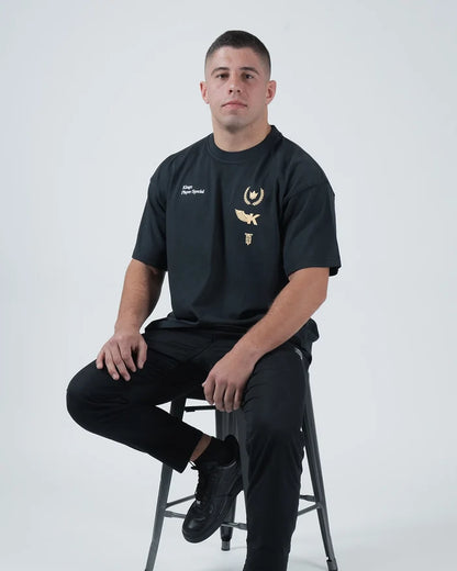 Kingz Player Special Tee - Seated Lifestyle Front - Gold Chest Graphics Editorial BJJ Limited Edition Tee Black [color:Black]