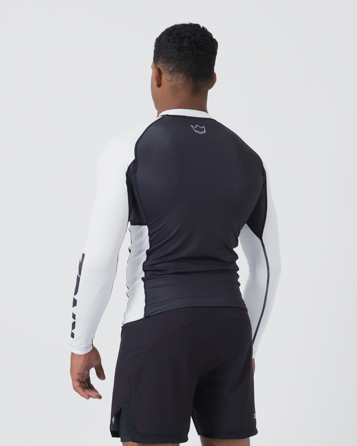 Kingz Ranked Performance V2 L/S Rashguard Navy White - Full Body 3/4 Back View Male Athlete Long Sleeve Navy Body White Sleeve KINGZ Bold Text White Crown Logo Upper Back Navy Shorts BJJ Competition Performance [color:White]