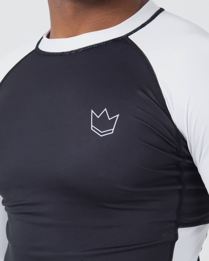 Kingz Ranked Performance V2 L/S Rashguard Navy White - Close Up Chest Logo Detail White Crown Logo Chest Navy Body White Raglan Sleeves White Neck Collar Mesh Panel Texture Performance Fit BJJ Competition Guard [color:White]