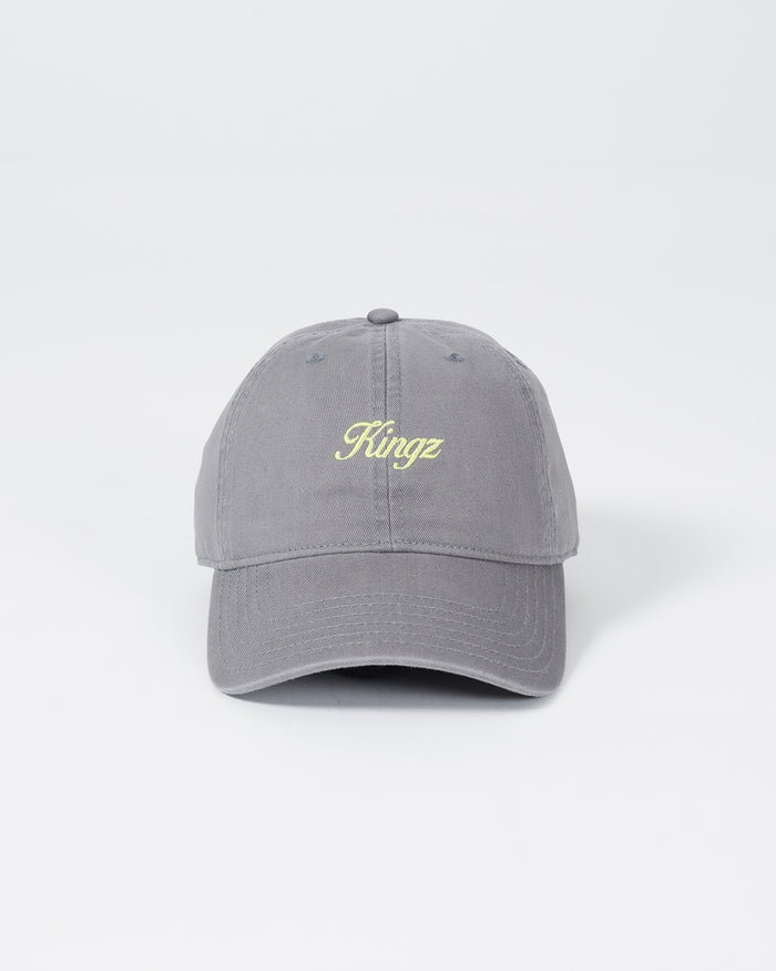Kingz Script Dad Hat - Grey - Front View Embroidered Yellow Kingz Logo Centered Curved Brim Classic Fit Soft Cotton Fabric Casual Style BJJ Training Apparel [color:Grey]