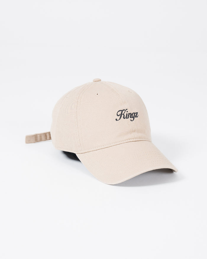 Kingz Script Dad Hat - Khaki - Angled Front View Beige Cotton Hat Black Script Logo Adjustable Strap Casual BJJ Training Apparel [color:Beige]