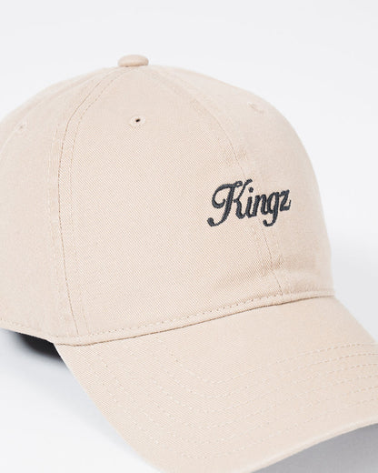 Kingz Script Dad Hat - Khaki - Close-Up Front View Embroidered Black Kingz Script Text Curved Brim Ventilation Eyelets Beige Cotton Casual Fit BJJ Training Apparel [color:Beige]