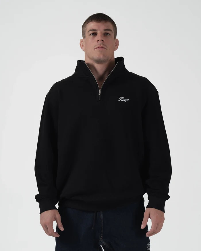 Kingz Script Quarter Zip Sweater Black - Front View Male Athlete Black Sweater White Script Logo Left Chest Quarter Zip Collar Relaxed Fit Casual BJJ Training Hoodie [color:Black]