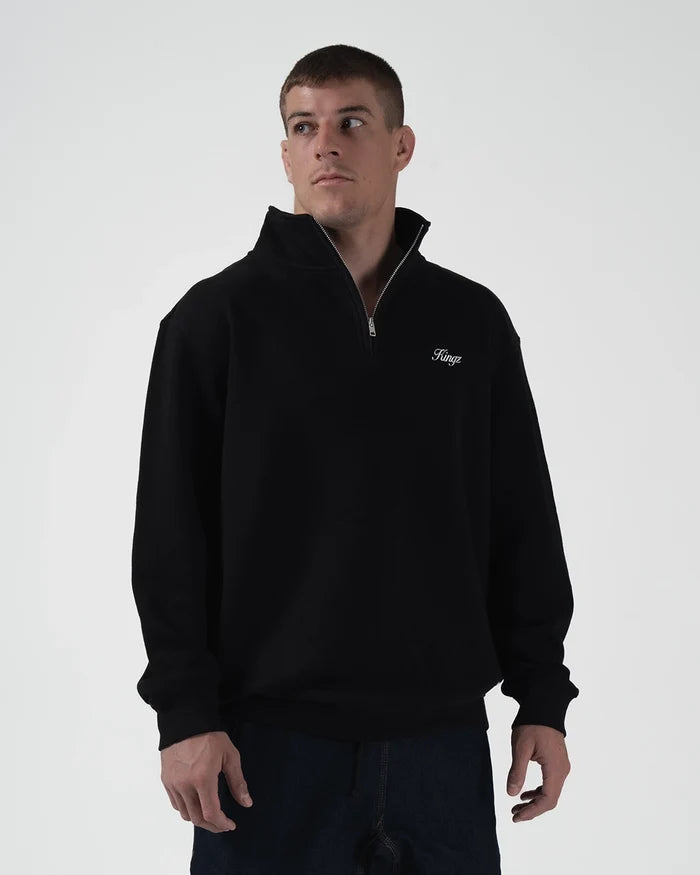 Kingz Script Quarter Zip Sweater Black - Front View Male Athlete Black Sweater White Script Logo Left Chest Quarter Zip Design Relaxed Fit BJJ Training Hoodie [color:Black]