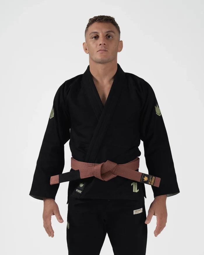 Kingz The ONE V2 LE BJJ Gi Black Green front view showing brown belt and green accent crown logos