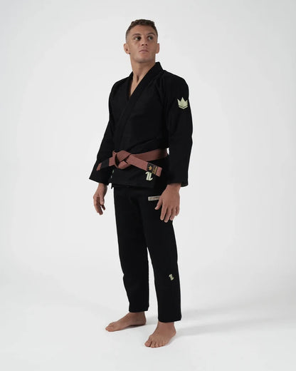 Kingz The ONE V2 LE BJJ Gi Black Green full body front view showing complete gi set and brown belt
