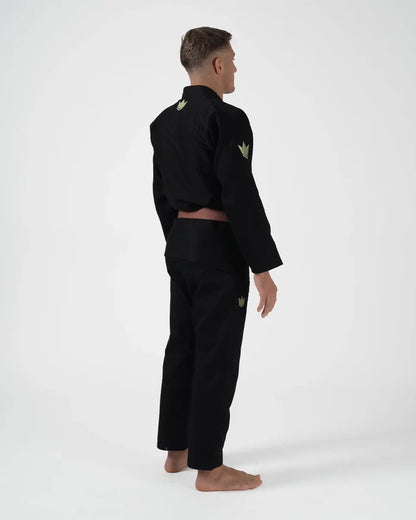 Kingz The ONE V2 LE BJJ Gi Black Green three-quarter back view showing green crown logo and sleeve patch