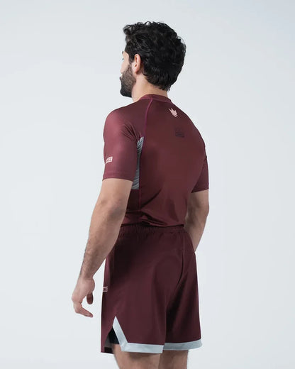 Kingz Trooper Rashguard Maroon - Full Body Back View Male Athlete Short Sleeve Crown Logo Upper Back Side Seam Detail Maroon Shorts [color:Maroon]