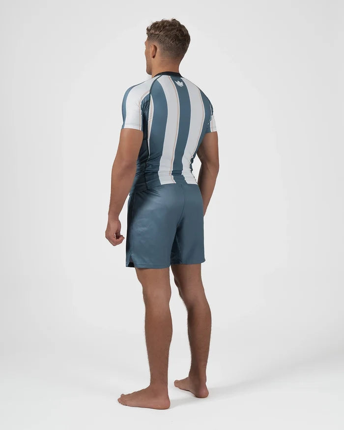 Kingz Vintage Futebol Rashguard Blue White Stripe - Full Body Back View Barefoot Male Athlete Short Sleeve Vertical Stripes Back Panel Logo Gray Shorts Retro Football Kit [color:Green/Vintage]