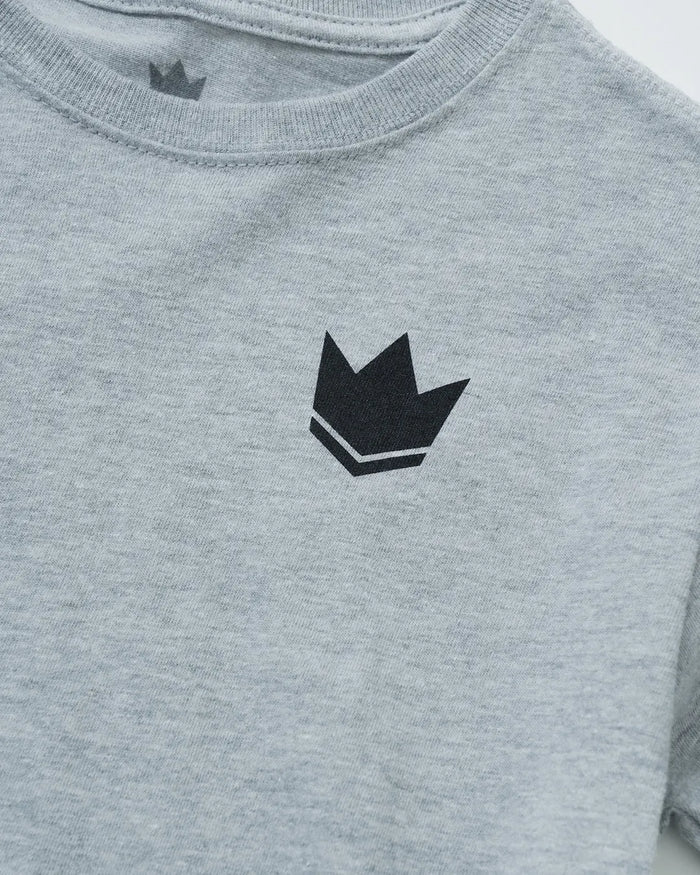 Kingz Kore V2 Youth Tee - Detail Shot - Black Crown Logo Close-up - Light Gray Youth BJJ Casual Wear [color:Black]