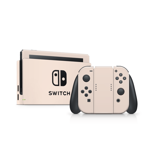 Light creme Nintendo Switch skin with beige and orange creme tones on matte vinyl