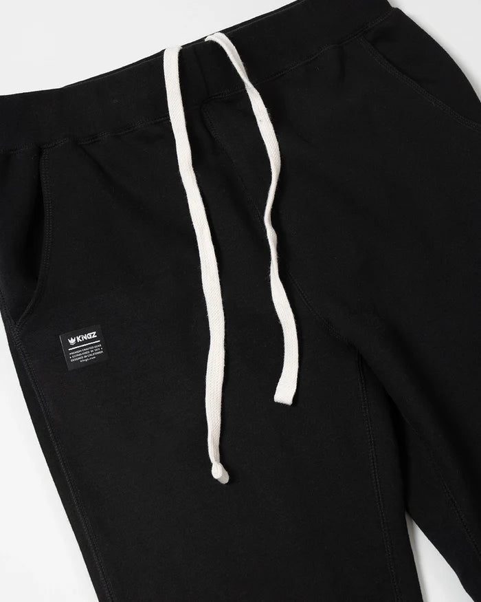 Kingz Loungewear Jogger Black - Close-Up Detail View Black Jogger White Drawstring Kingz Logo Patch Left Pocket Soft Cotton Blend Relaxed Fit Casual Training Pants BJJ [color:Black]