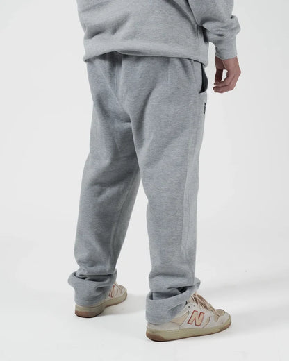 Kingz Loungewear Jogger Grey - Back View Male Athlete Elastic Waistband Relaxed Fit Side Pocket Subtle KINGZ Logo Soft Fabric Comfortable Design BJJ Training Casual Wear [color:Grey]