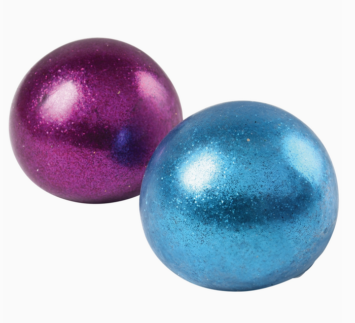 Two metallic balls, one purple and one blue, on a white background