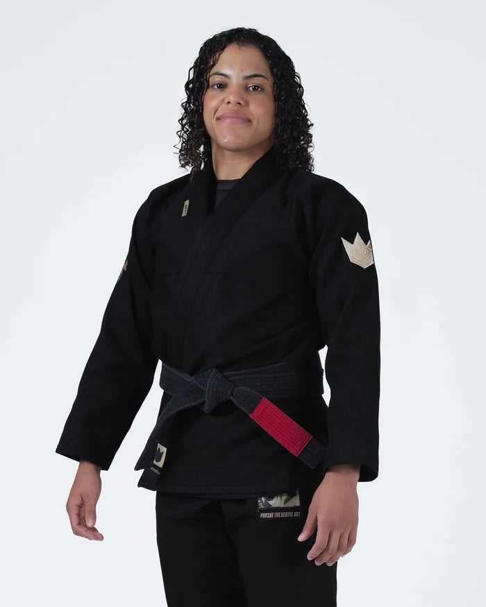 Kingz Pursue the Gentle Art Limited Edition Women's Jiu Jitsu Gi Black - Front View Female Athlete Gold Crown Shoulder Patch Black Belt Red Patch Pursue the Gentle Art Text BJJ Gi [color:Black]