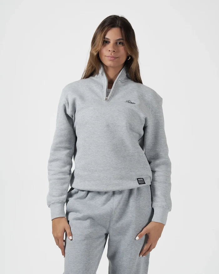 Kingz Script Quarter Zip Sweater Light Gray - Front View Female Model Embroidered Script Logo Left Chest Ribbed Cuffs Hem Relaxed Fit Soft Fabric Casual Wear Hoodie Training Apparel [color:Light Gray]