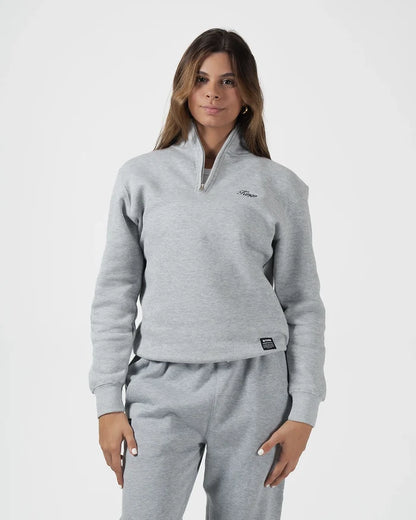 Kingz Script Quarter Zip Sweater Light Gray - Front View Female Model Embroidered Script Logo Left Chest Ribbed Cuffs Hem Relaxed Fit Soft Fabric Casual Wear Hoodie Training Apparel [color:Light Gray]