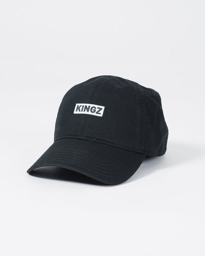 Kingz Slant Dad Hat - Black - Angled Front View Embroidered KINGZ Text Center Panel Curved Brim Classic Fit Black Cotton Casual Headwear BJJ Lifestyle [color:Black]
