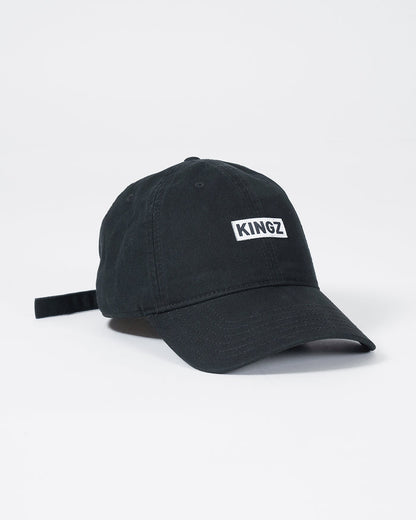 Kingz Slant Dad Hat Black - Angled Front View Black Hat KINGZ White Text Logo Front Panel Curved Brim Adjustable Strap Casual Wear BJJ Training Accessory [color:Black]