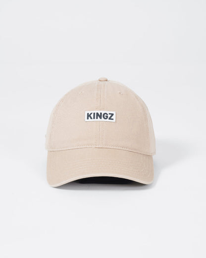Kingz Slant Dad Hat Beige - Front View Embroidered KINGZ Logo Center Khaki Cotton Fabric Curved Brim Casual Fit Adjustable Strap Versatile Headwear BJJ Training Apparel [color:Beige]