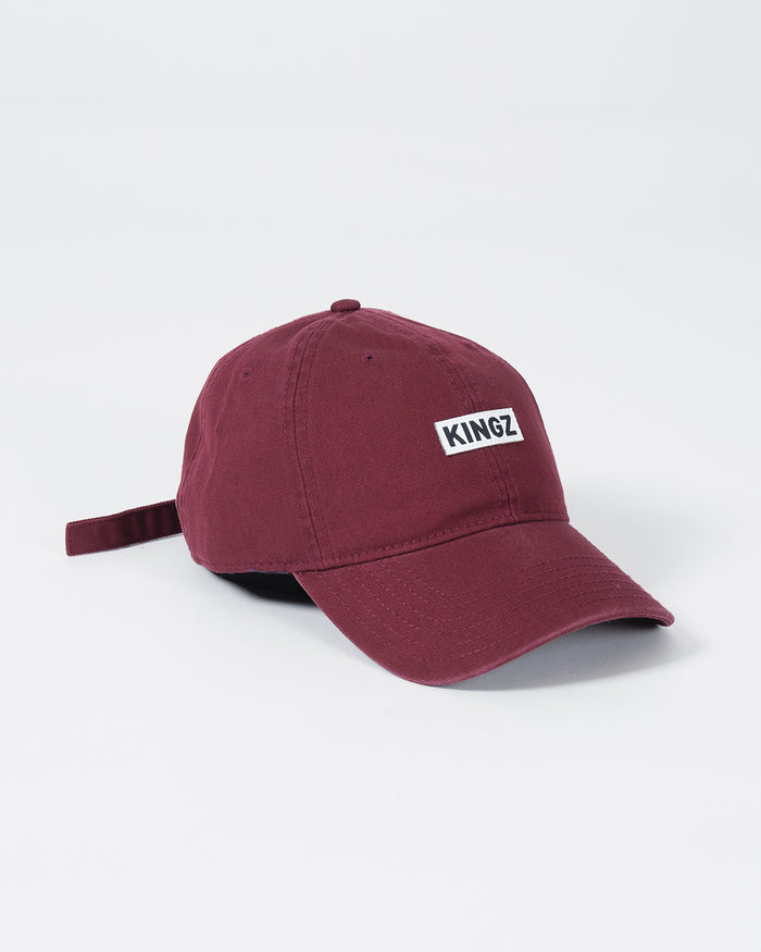 Kingz Slant Dad Hat Maroon - Angled Front View Maroon Hat KINGZ Logo Front Adjustable Strap Casual Fit Headwear BJJ Training Apparel [color:Maroon]