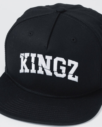 Kingz Slice Snapback - Black - Close-Up Front View Bold White KINGZ Text Centered Black Structured Crown Flat Brim Eyelets Streetwear Style BJJ Training Hat [color:Black]