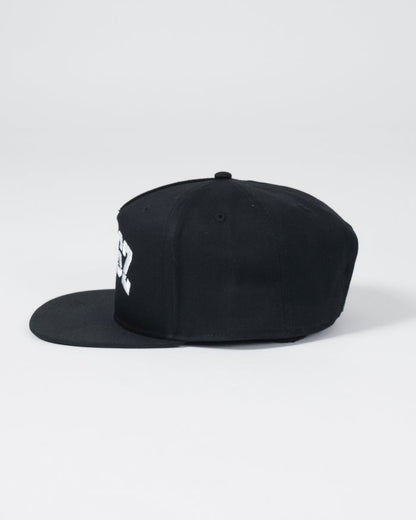 Kingz Slice Snapback - Black - Side View Black Hat White KINGZ Text Front Panel Flat Brim Embroidered Ventilation Eyelets Adjustable Snapback Closure BJJ Training MMA [color:Black]