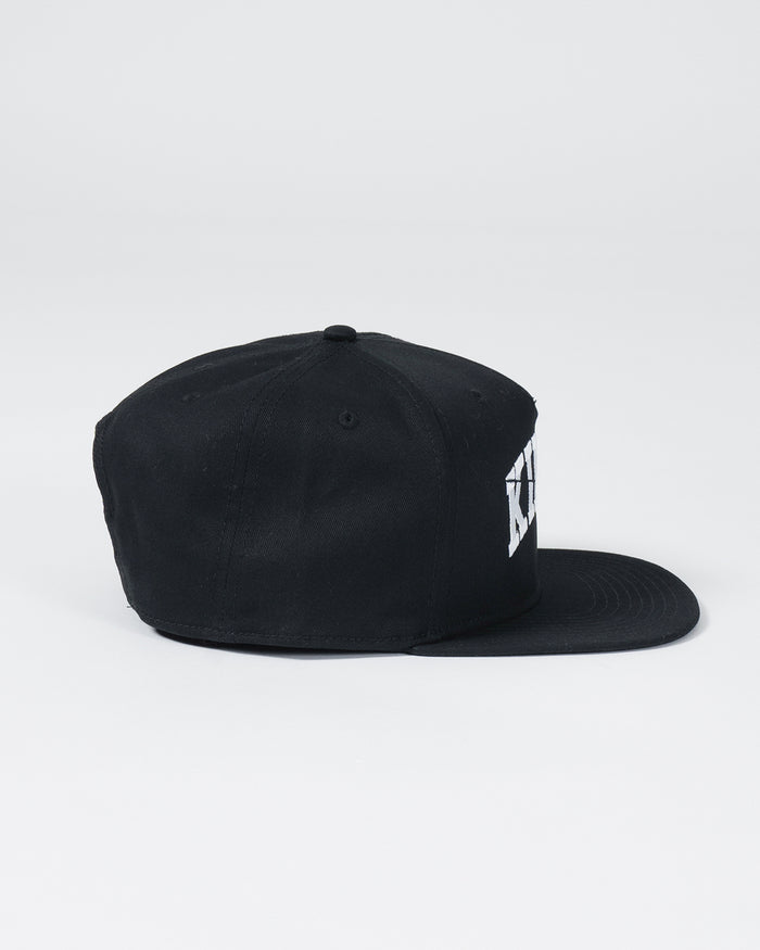 Kingz Slice Snapback - Black - Side View Black Hat Bold KINGZ Text Embroidered Side Panel Flat Brim Classic Fit Adjustable Snapback BJJ Training Apparel [color:Black]