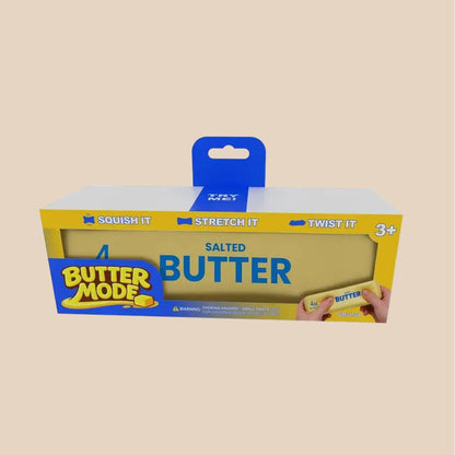 Box of 'Butter Mode' toy with yellow and blue design on a white background