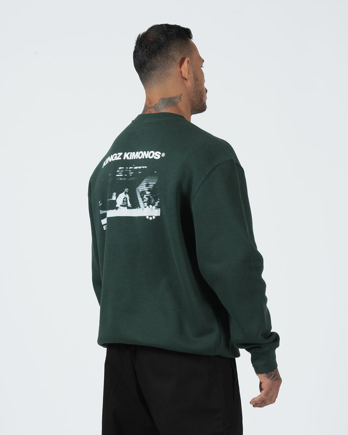Kingz Solo Crewneck - Rear Angle View - Back Graphic and Relaxed Sleeve - Dark Forest Green - BJJ Streetwear Crewneck
