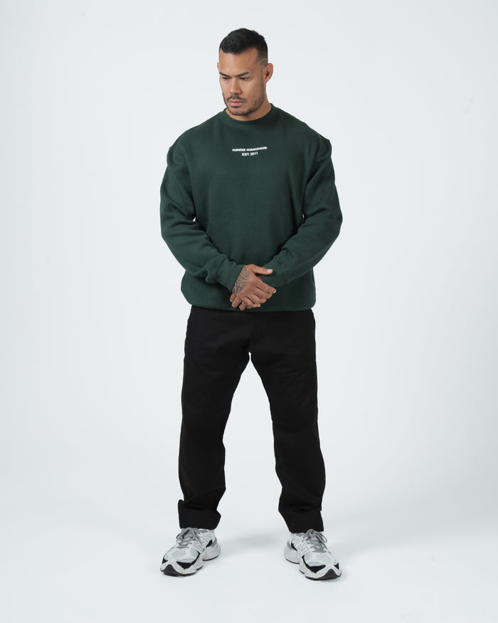 Kingz Solo Crewneck - Worn Pose View - Soft Fleece Drape and Chest Print - Dark Forest Green - BJJ Streetwear Crewneck