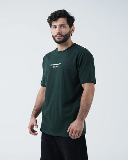 Kingz Solo Tee - Front Angle View - Kingz Kimonos Est 2011 Chest Text Side Profile - Dark Forest Green BJJ [color:Dark Forest Green]