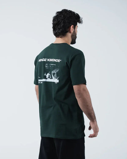 Kingz Solo Tee - Back Three Quarter Angle - Kingz Kimonos BJJ Photo Print Back Side View - Dark Forest Green [color:Dark Forest Green]