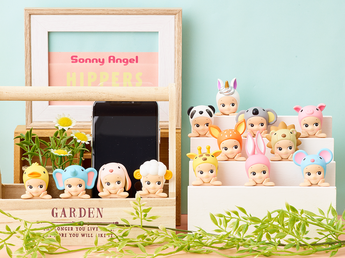 A group of toy animal heads with ears displayed on shelves, including a toy elephant, mouse, and bunny, part of Sonny Angels - HIPPERS Series.