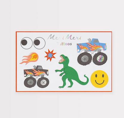 Collection of colorful tattoos including monster trucks and a dinosaur on a white background.